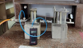 Steel porosimeter for high-pressure porosity analysis in tight rocks