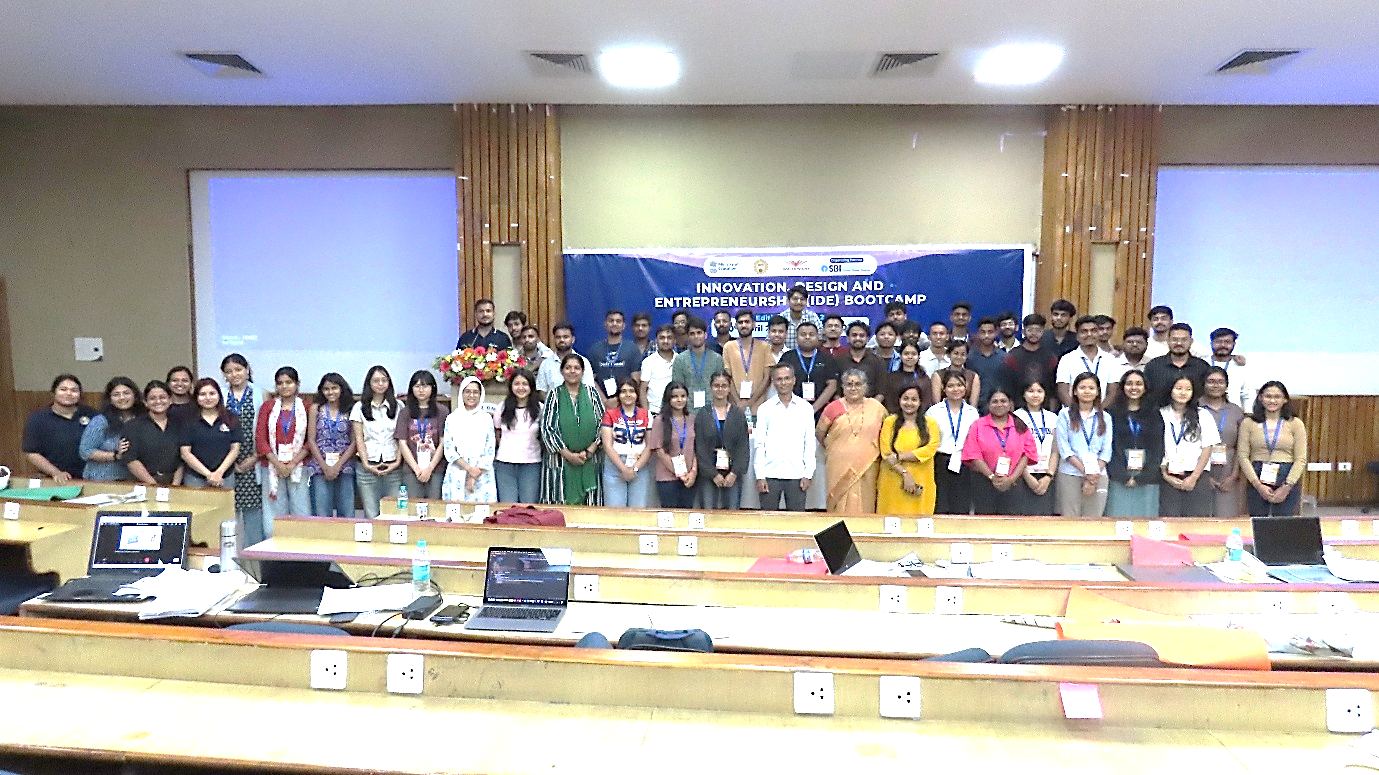 Participants with speakers at the end of Day 4