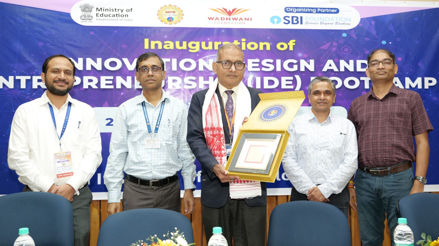 Guests presenting a memento to a dignitary during the inauguration of IDE Bootcamp 2026